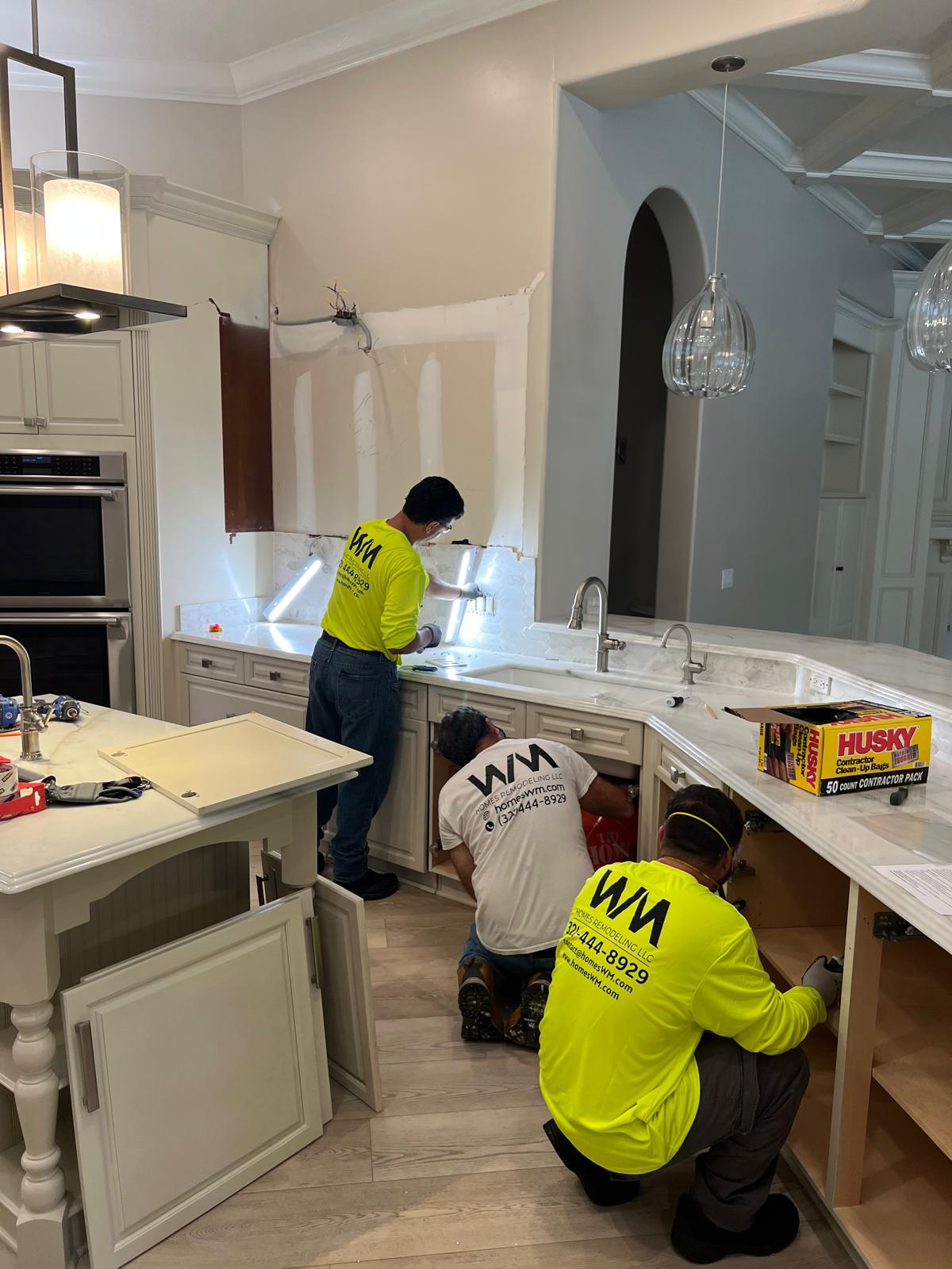 WM Homes Remodeling team renovating a kitchen